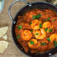 Prawn Curry · Yummy prawns cooked in brown curry sauce.