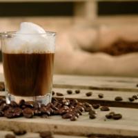 Espresso Macchiato · Rich, dark espresso shots with frothed milk.