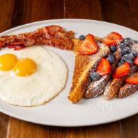 French Toast Combo · Brioche French toast topped with fresh fruits and cheesecake frosting, 2 eggs any style with...