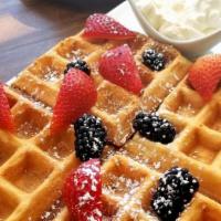 Waffles · Classic Belgian waffles topped with fresh berries