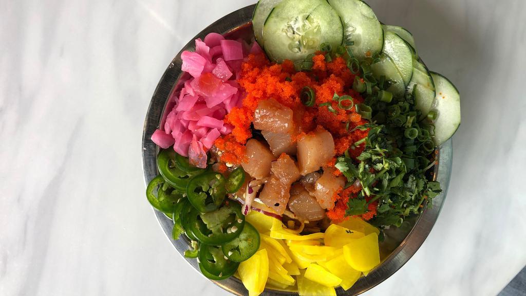 Pepper-Fin Bowl · Albacore tuna (raw), masago, cilantro, cucumber, green onion, pickled daikon, pickled radish, jalapeno, rice, kim chee ponzu, sesame chili oil