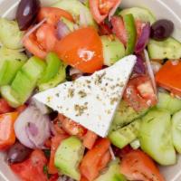 Greek Salad · The traditional village salad, tomatoes, cucumbers, red onions, peppers, kalamata olives, fe...
