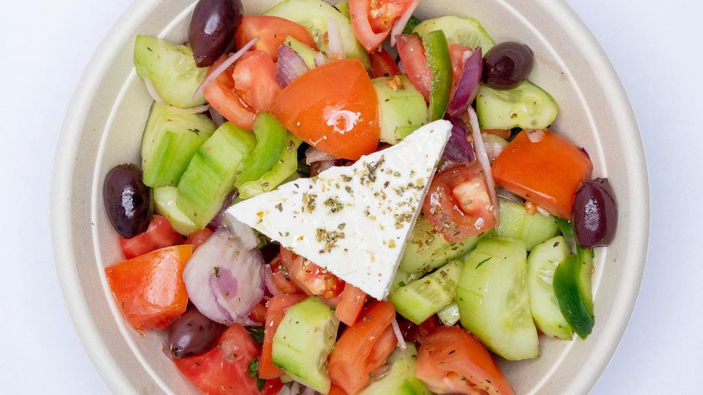 Greek Salad · The traditional village salad, tomatoes, cucumbers, red onions, peppers, kalamata olives, feta cheese, house dressing.