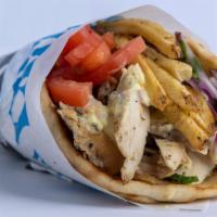 Chicken Gyro Pita · Thin slices of seasoned boneless chicken, stacked and cooked on a vertical rotisserie, serve...