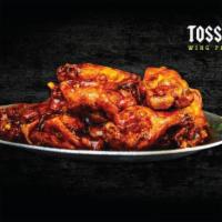 Traditional Wings · Traditional bone-in wings tossed in choice of sauce. Never breaded! Fried a bit well done......