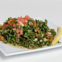 Tabouli · Chopped parsley, tomatoes, onions, lemon juice, cracked wheat, and olive oil.