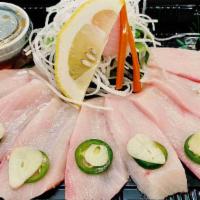 Yellowtail Jalapeño (8) · Yellowtail Sashimi & Garlic Jalapeno & Yuzu Ponzu Sauce.