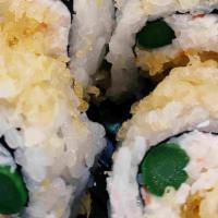 Crunchy Roll · Shrimp tempura and asparagus with crunchy flakes and crab meat.