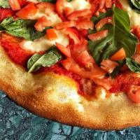Gluten-Free Margherita Pizza · Mozzarella cheese, pizza sauce, tomatoes, basil.