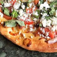 Gluten-Free Mediterranean Pizza · No sauce. mozzarella cheese, Feta cheese, fresh tomato, and fresh basil.