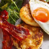 Eggs With Bread, Bacon Or Sausage Or Ham · Served with Bread.