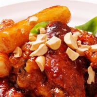 Spicy Crunchy Fried Chicken · Sweet and spicy crispy fried chicken with rice cake.