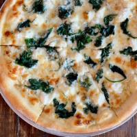  White Pizza · Our homemade savory white sauce with Ricotta and spinach on hand tossed NY dough