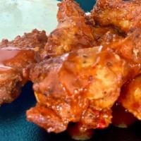 Buffalo Wings · Organic succulent chicken wings smothered in BF secret sauce. Served with homemade ranch or ...