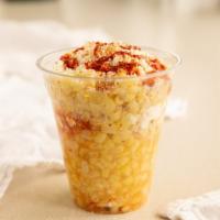 Elote En Vaso · Corn in a cup with sour cream, mayo, cotija cheese, Valentina, and tajin.