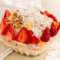 Bionico · Apples, cantaloupe, papaya, banana, strawberries, topped with our secret recipe sweet cream,...