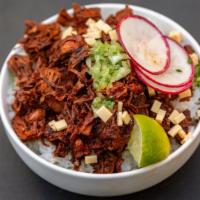 Birria Bowl · Savory vegan beef birria rice bowls made with seasoned jackfruit on a bed of Mexican rice to...