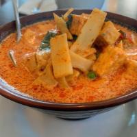 Red Curry · Red curry paste with bamboo shoots, basil and bell pepper.
