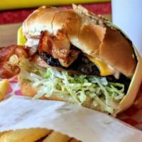 Bacon Cheeseburger · Bacon, cheese, 1000 Island dressing, onions, lettuce, tomato and pickles.
