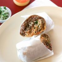 Asada Burrito · Rice, bean, asada, onion, cilantro and salsa.