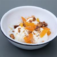 Labneh · Organic Middle Eastern yogurt with honey, walnuts, dried apricot.