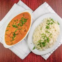 Butter Chicken · Marinated pieces of boneless chicken in creamy masala sauce served with basmati rice.