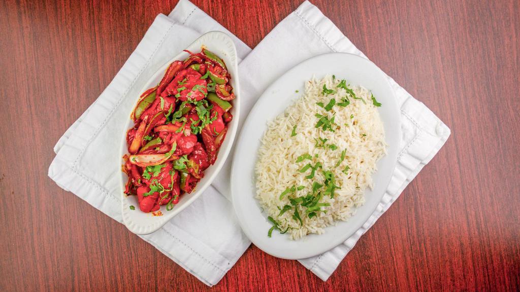 Chicken Tikka · Marinated pieces of boneless chicken in spices and vegetables with basmati rice.