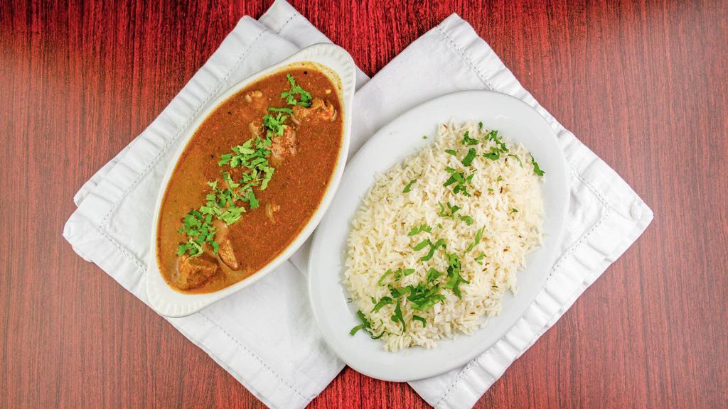 Lamb Curry · Boneless pieces of lamb in curry sauce with special spices and basmati rice.