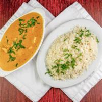 Vegetarian Shahi Paneer · Cubes of paneer in a gravy made up of cream, tomatoes and spices with basmati rice.