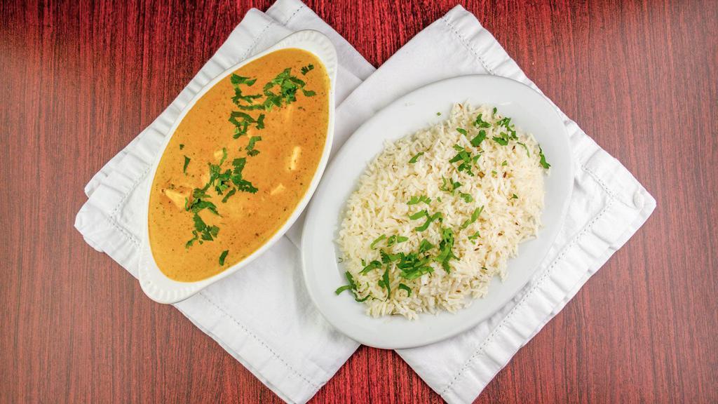 Vegetarian Shahi Paneer · Cubes of paneer in a gravy made up of cream, tomatoes and spices with basmati rice.