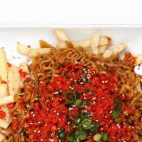 Flaming Inferno Nood-Fries · Korean Super Spicy Chicken Flavored Ramen With Hot Cheetos Crunch on top of our house fries....