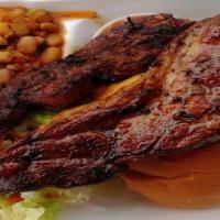 Country Style Pork Ribs Plate · Two Ribs with Sides: salad, salsa, bread, chili beans