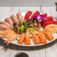 Sushi Special · 20 pieces of sushi with dragon roll. Comes with soup and salad.