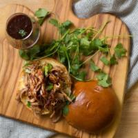 Bbq Pulled Pork · Slow roasted pulled pork with our homemade bbq sauce, fontina cheese and red onions on a ham...