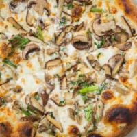 Mushroom Truffle Pizza | Lunch · White sauce, Gouda cheese, fontina cheese, topped with fresh seasonal mushrooms sautéed in o...