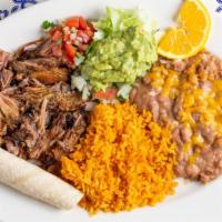 Carnitas · Meat, guacamole on the side, rice & beans on the side, choice of tortilla