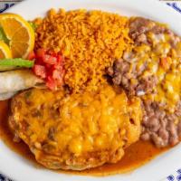 Chile Relleno Omelette · Chile relleno, egg, topped with relleno sauce, choice of tortilla, rice & beans on the side