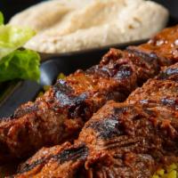 Shish Kabab Plate · Grilled marinated beef served with Greek salad and choice of rice or fries.