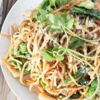 Veggie Garlic Noodle · Garlic noodles stir-fried with carrots,cabbage , yuchoy, brocolli, and mushrooms, and topped...
