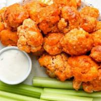 Cauliflower Wings · Choose your sauce: buffalo, natural, BBQ.