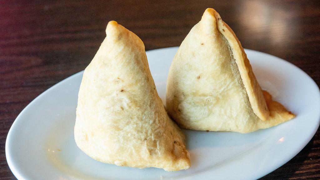 Vegetables Samosa (2 Pieces) · Deep fried pastry stuffed with spices potatoes and green peas. Served with tamarind chutney.