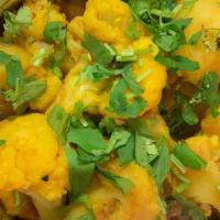 Aloo Gobi · Vegetarian. Cauliflower and potatoes with onion and tomato sauce cooked with Himalayan spices.