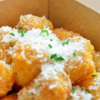 Truffle Tots · Parmesan cheese, truffle oil, chives.