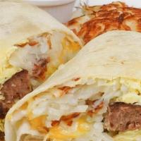 Breakfast Burrito · 2 Strips of bacon, 1 sausage, 2 eggs scrambled and cheddar cheese all wrapped in a warm flou...