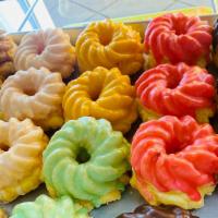 French Cruller  · Choice of  toppings: strawberry , orange, blueberry, vanilla, chocolate, Maple, Pistachio nu...