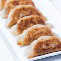 The Impossible Potsticker · Pan-seared, gluten-free potstickers filled with Impossible 