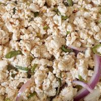 Larb Gai · Minced chicken, chill, red onions, rosted rice powder, fresh
mints, seasoned w/spicy lime dr...