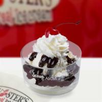 Hot Fudge Sundae · 2 Scoops of vanilla in a cup, hot fudge, whip cream, and a cherry.