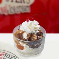 Peanut Butter Cup Sundae · Two scoops of freshly made vanilla ice cream topped with hot fudge, warm peanut butter, chop...