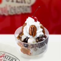 Turtle Sundae · Two scoops of freshly made vanilla ice cream, hot fudge and hot caramel, pecans, whipped cre...
